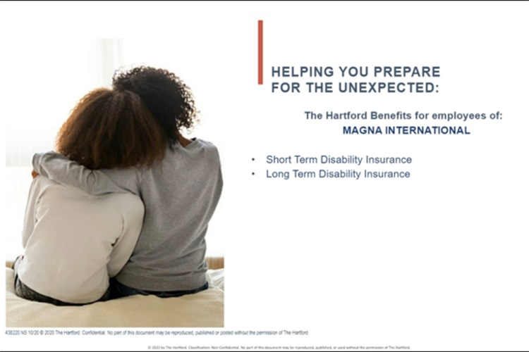 Two people sitting with one person with their arm around the other person's shoulder