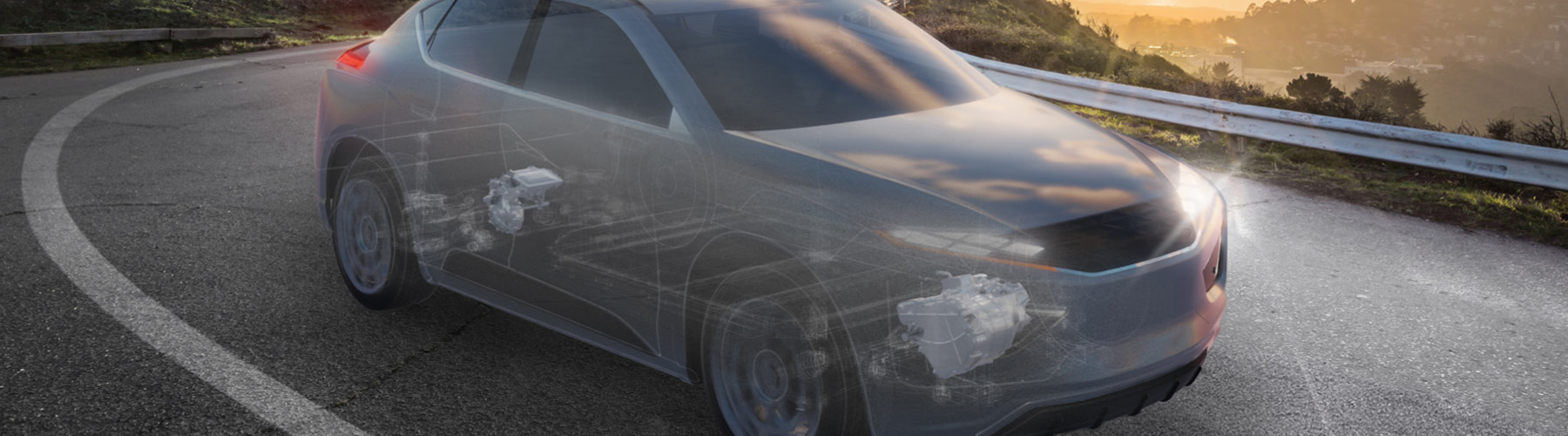 Ghosted grey vehicle driving along a road with grassy mountains showing the powertrain systems