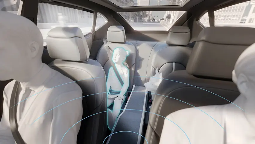 車内の後部座席でチャイルドシートに座る子どもを安全システムが検知しているイラスト