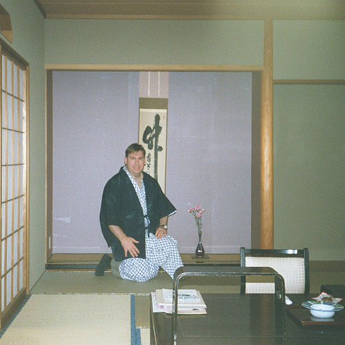 Doug Plester in a dining room in Japan