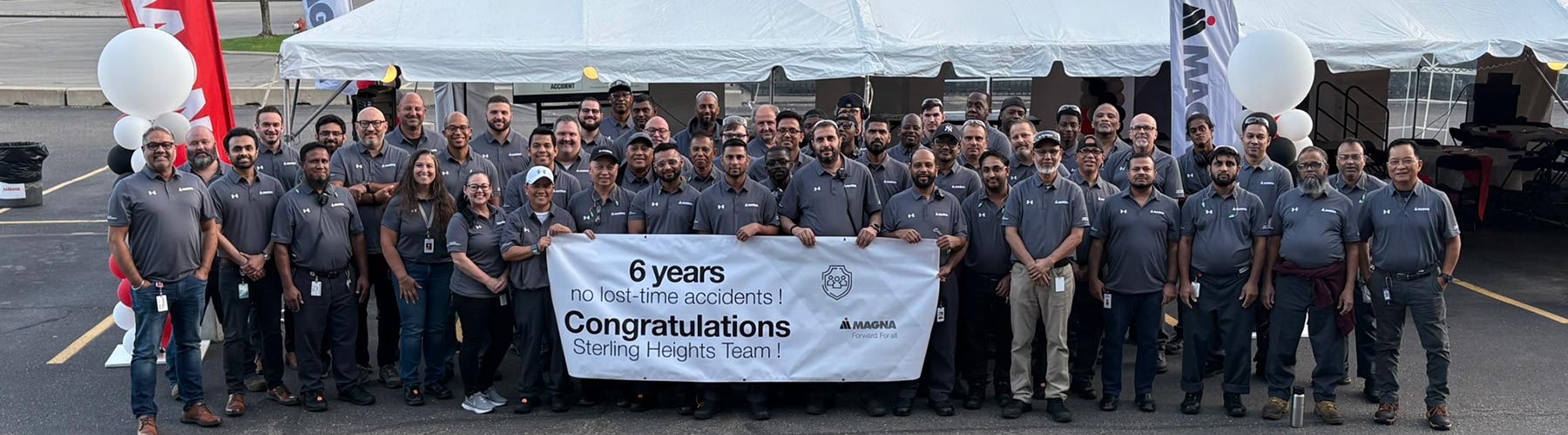 People's feet running a race with pilons lining the route